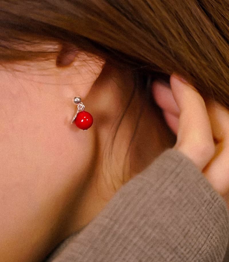 red pearl earring