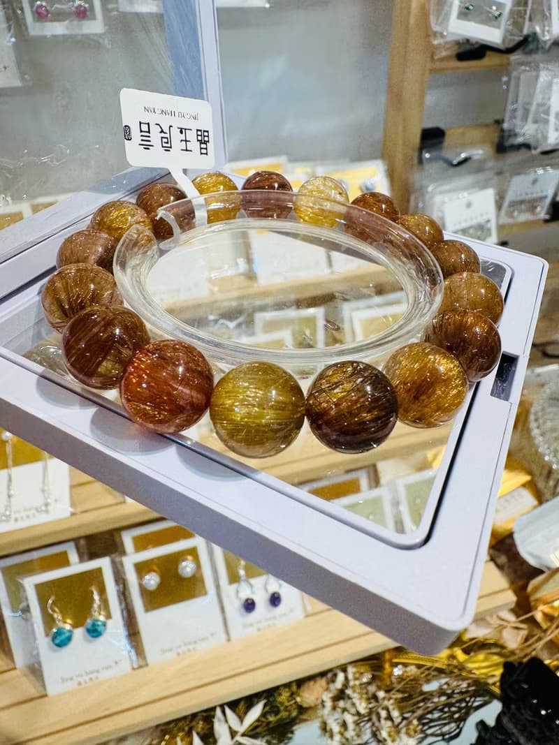 收藏拉絲順強光貓眼金銅髮晶11.7-12.7mm46.34g正財偏財正面能量