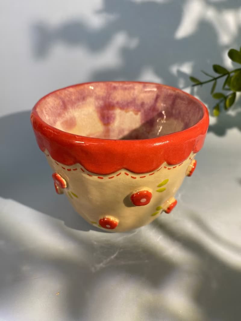 Handmade ceramic cup. Handmade ceramic mug with cute flower lover pattern for gifts.