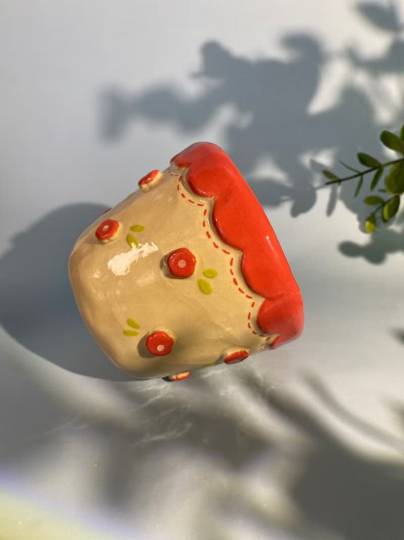 Handmade ceramic cup. Handmade ceramic mug with cute flower lover pattern for gifts.