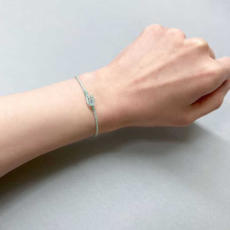 海藍寶四股編超細蠟線編織手環( 淺綠+米黃)