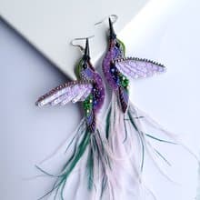 Embroidered hummingbird earrings made of seed beads and feather