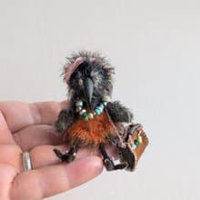 Fashionista Crow. This beauty is crocheted.