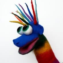 Funny multicolored puppet, glove puppet for puppet theater. Made of natural wool