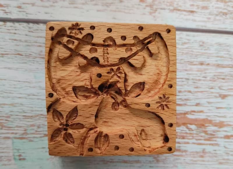 Double-sided cookie stamp with Christmas drawings