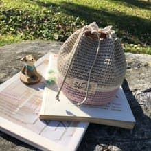 鉤織工藝。雙色苧麻束口化妝包(灰紫)