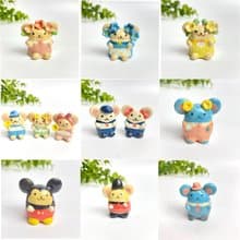 Cute handmade ceramic mice in various designs.