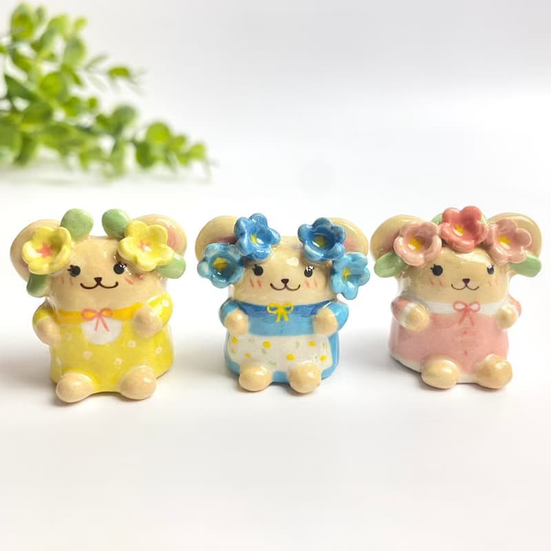 Cute handmade ceramic mice in various designs.