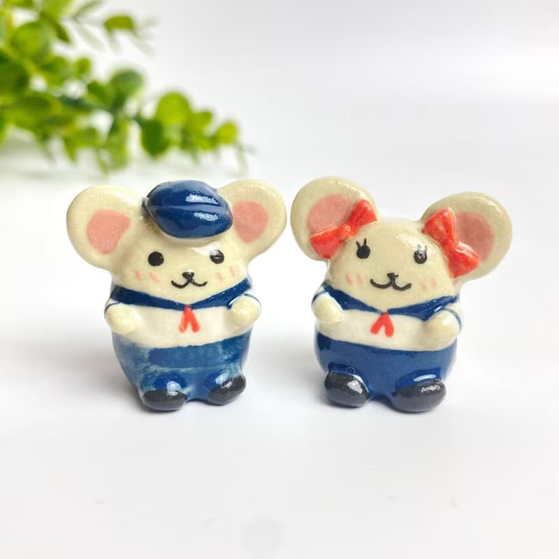 Cute handmade ceramic mice in various designs.