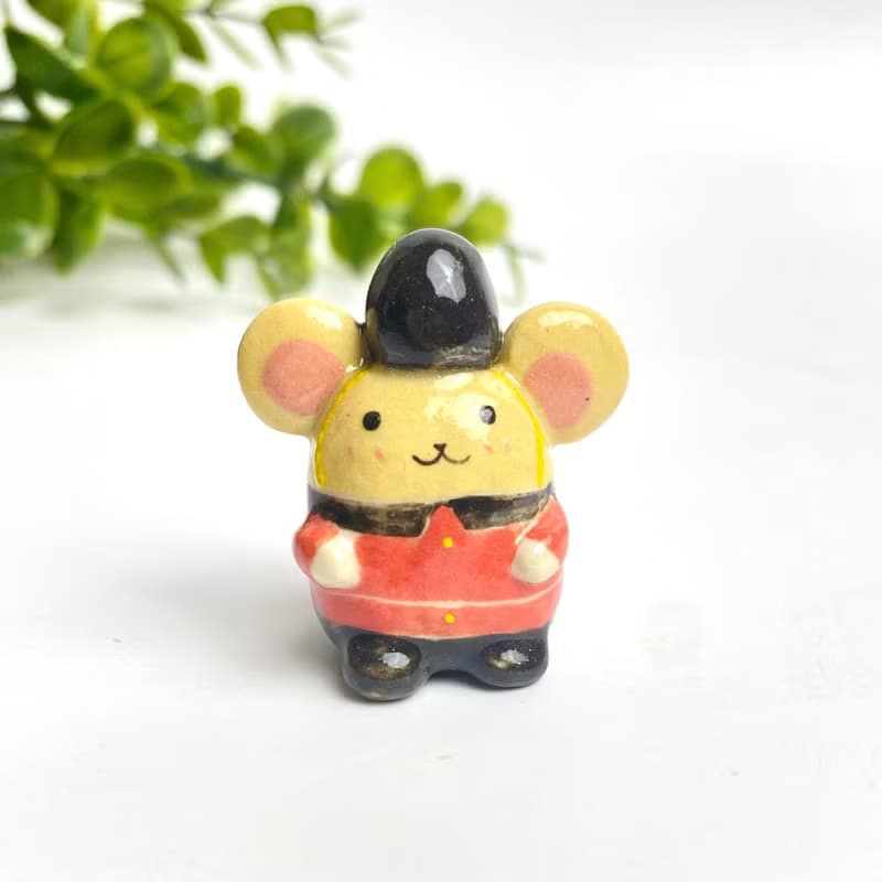 Cute handmade ceramic mice in various designs.