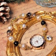 。伯爵夫人的美麗與哀愁。k金包銅高貴優雅天然水晶實用手錶