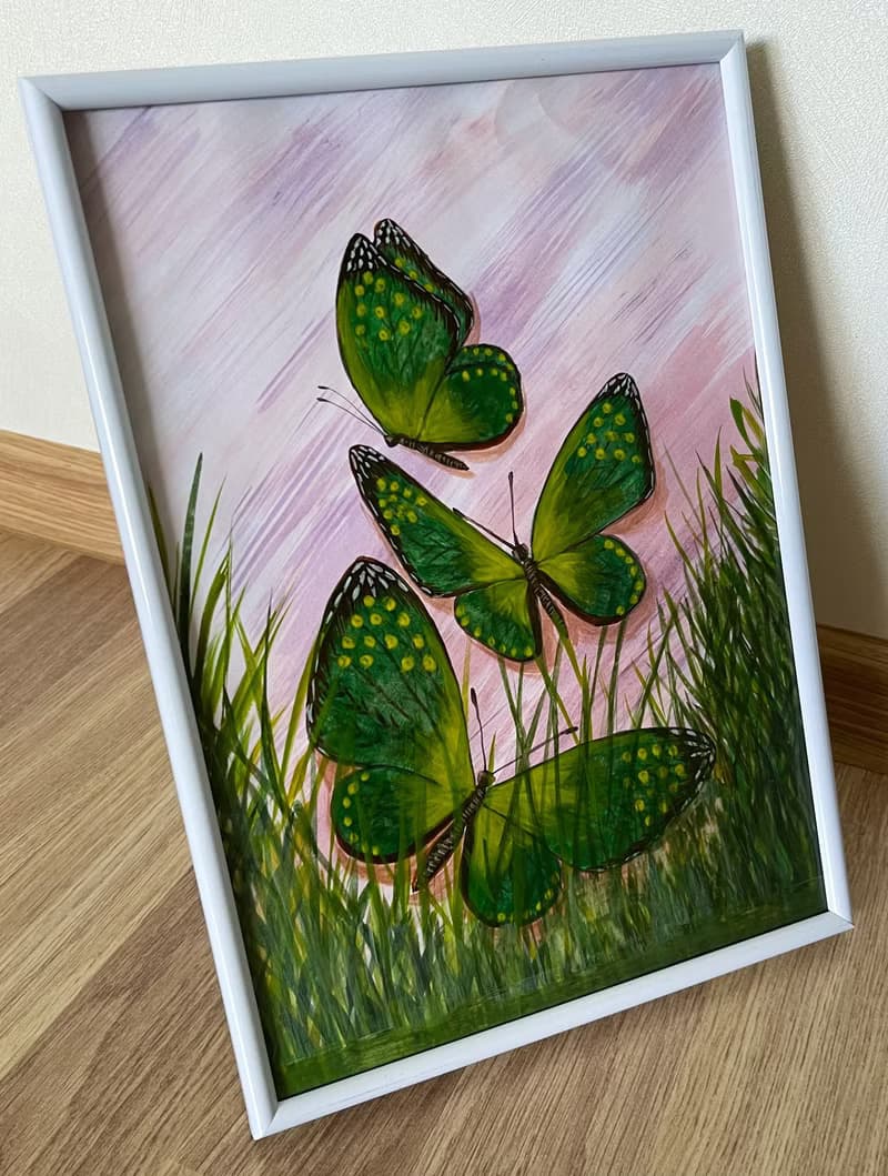 Green butterflies in the marsh grass. Watercolor.