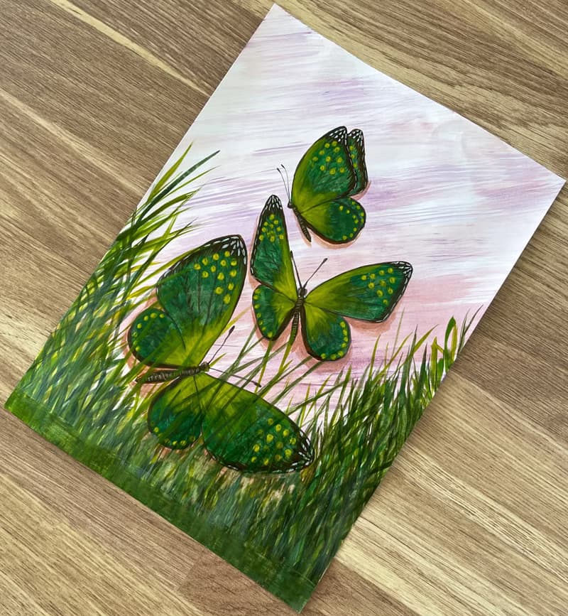 Green butterflies in the marsh grass. Watercolor.
