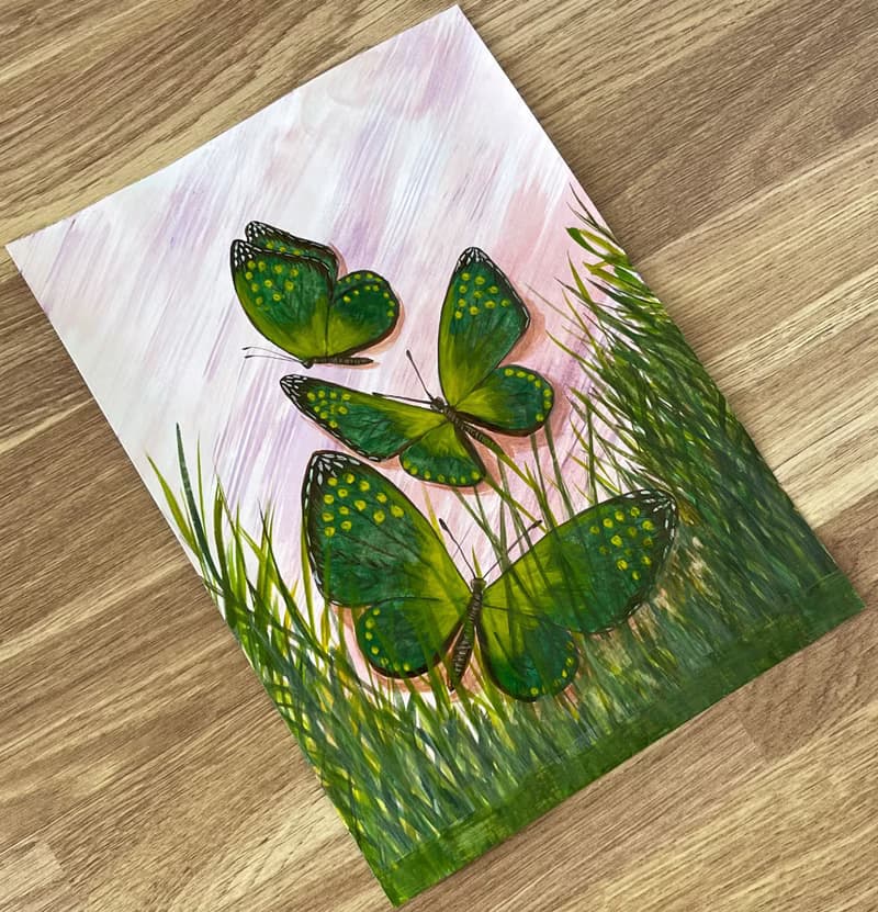 Green butterflies in the marsh grass. Watercolor.