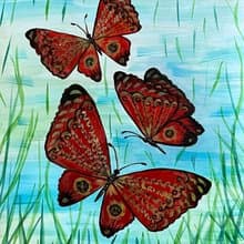 Openwork butterflies in green grass. Watercolor.