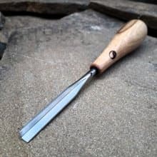 Forged V-groove. Compact V-chisel. Wood carving tool.