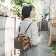 【24hr快速出貨】都市隨行 真皮復古金口後背包-234072 htn