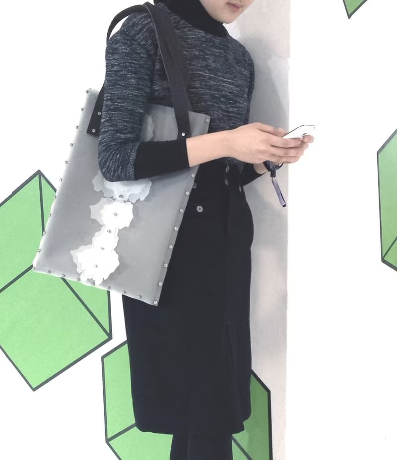 型格實用 得獎劍蘭花螺絲組裝單肩包 可放筆記簿電腦
