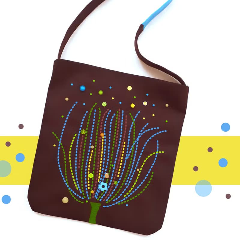 12x13.25 inch tote bag. Fun and original with hand-stitched design and beads