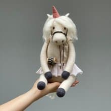 Needle felting wool sculpture unicorn