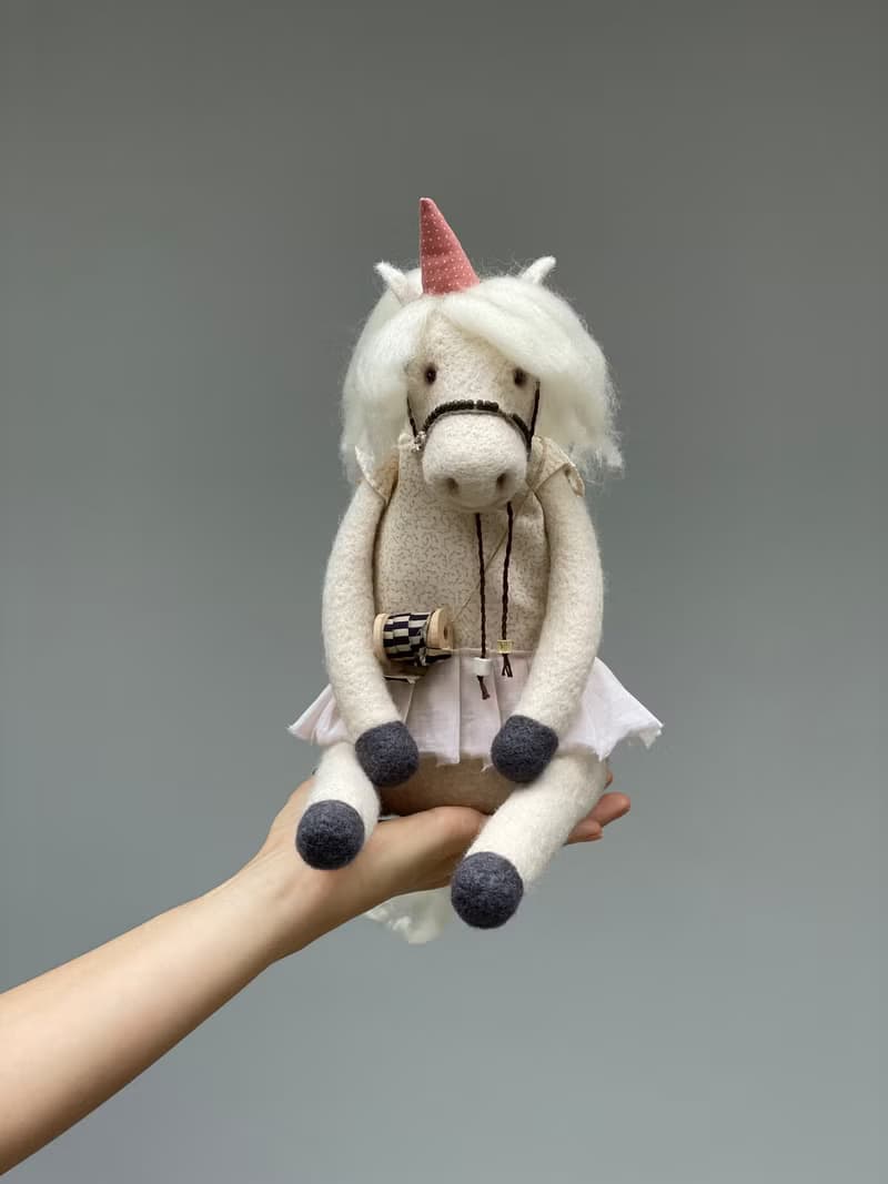 Needle felting wool sculpture unicorn