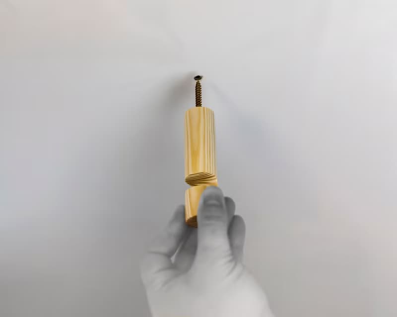 Cord keeper ceiling and wall hook for swag pendant. chandelier lighting