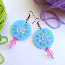 Cute free-form dangle earrings design with hand-stitching on hard felt, beads