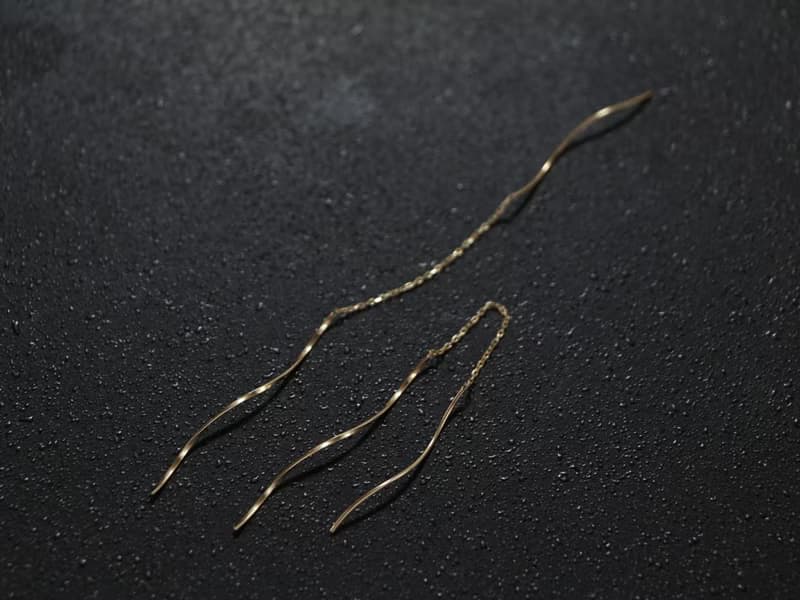 K10 yellow gold- solid gold nuance wave pierced earrings