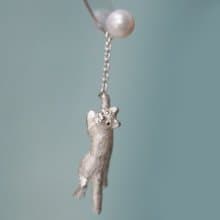 風船をつかまえた猫ピアス 片耳