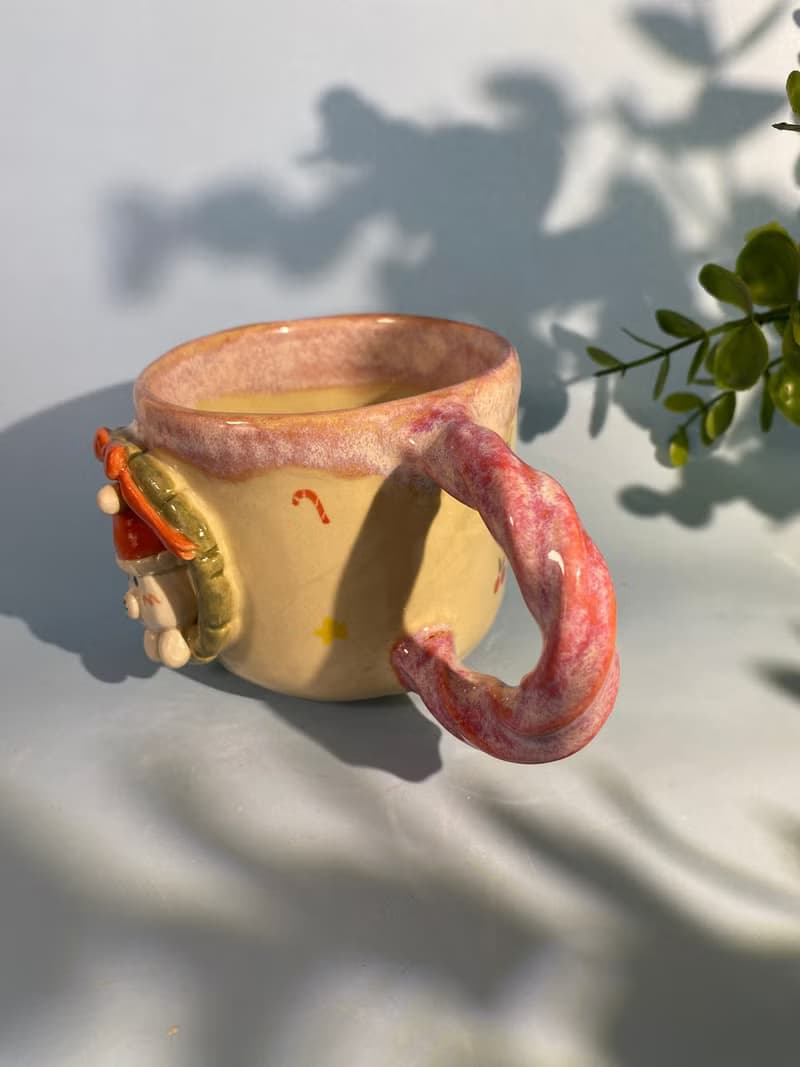 Handmade ceramic cup. Handmade ceramic mug with cute Santa cat pattern. for gifts
