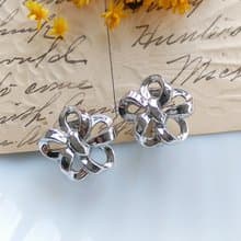 Vintage Jewelry 西洋古董飾品 TRIFARI 銀色調 小花結 夾式耳環