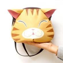 Orange cat crossbody bag is compact fro carrying mobile phones.