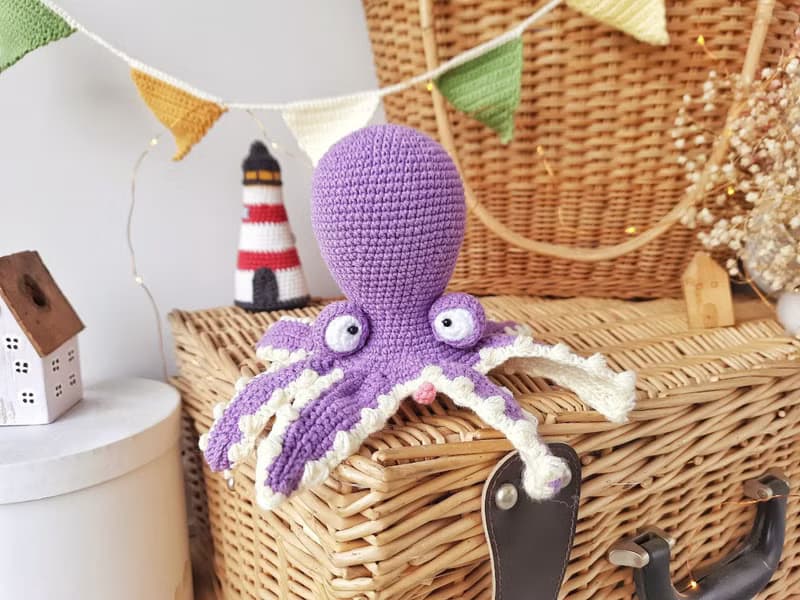 Soft toy octopus. Purple octopus crocheted from cotton yarn. Octopus is 7 inches