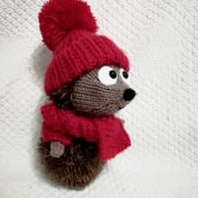 Toy knitting patterns - Hedgehog in a red hat We knit a cute little animal