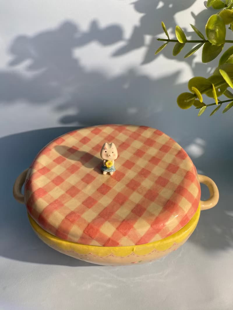 Cute handmade ceramic bow with lid, pink check pattern and cute cat.