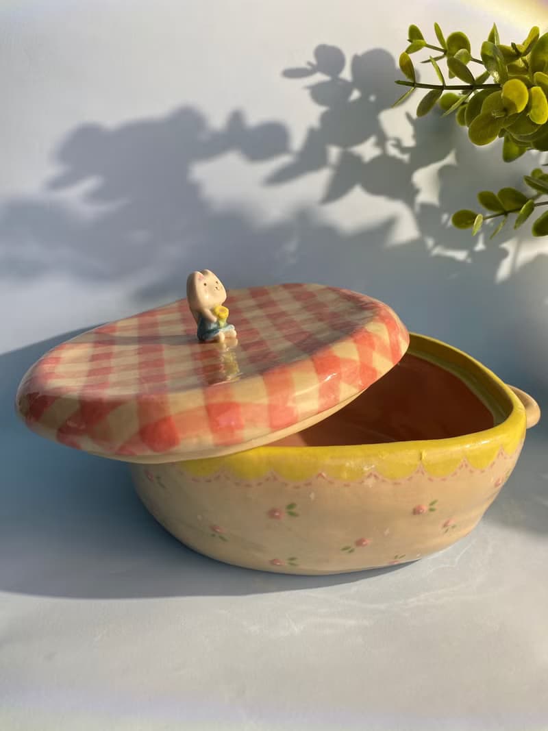 Cute handmade ceramic bow with lid, pink check pattern and cute cat.