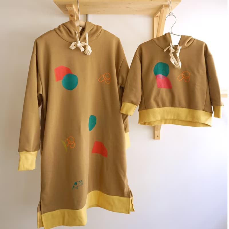 BABY&KIDS 漂亮黃棕印花長版口袋帽t 丁丁小貓 / 石頭圈圈 / 一座