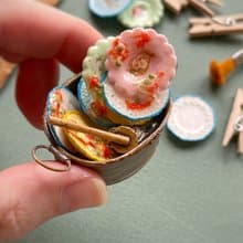 A miniature basin with dirty dishes