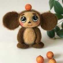 切布拉什卡玩具。 Cheburashka 氈制雕塑。 切巴什卡毛絨