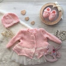 Hand knit pink outfit for baby girl. Dress with pearls and lace, hat, booties.
