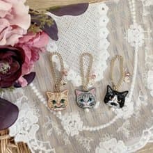 Nyaigs_猫さん刺繍と花束ビジューのバッグチャーム