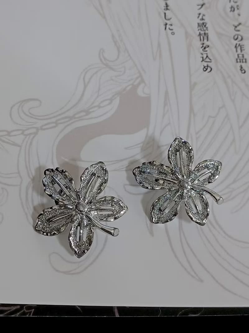 vintage jewelry SARAH COV 亮銀花卉夾式耳環