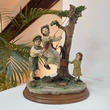 Capodimonte – Large sculpture of children on a swing