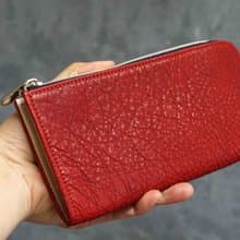 シュリンクWILDレッド：なめらかメダリオンファスナーL字長財布
