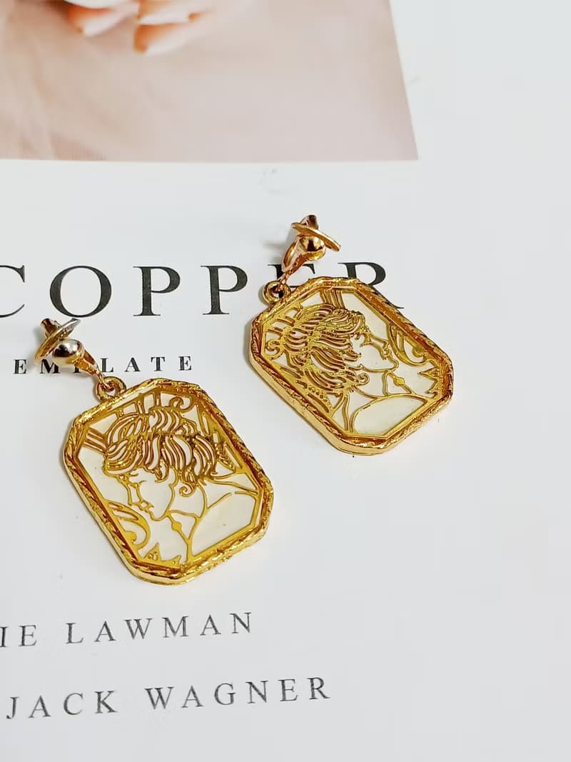vintage jewelry  1971 JANMAX 藝術風格 金色白底 春神夾式耳環