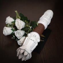 White wedding bouquet holder inspired by Rey's lightsaber hilt