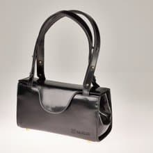 Black vegetable-tanned leather box bag