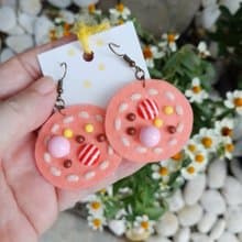 Handmade colorful free-form earrings with hand-stitching on felt with beads