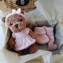 Teddy bear and booties baby gift for mom.Teddy bear in a pink dress pink shoes