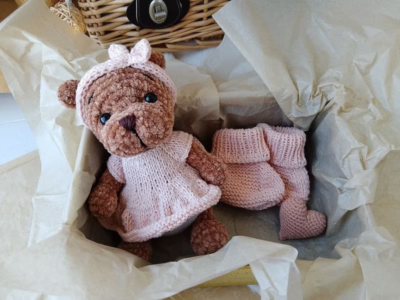 Teddy bear and booties baby gift for mom.Teddy bear in a pink dress pink shoes